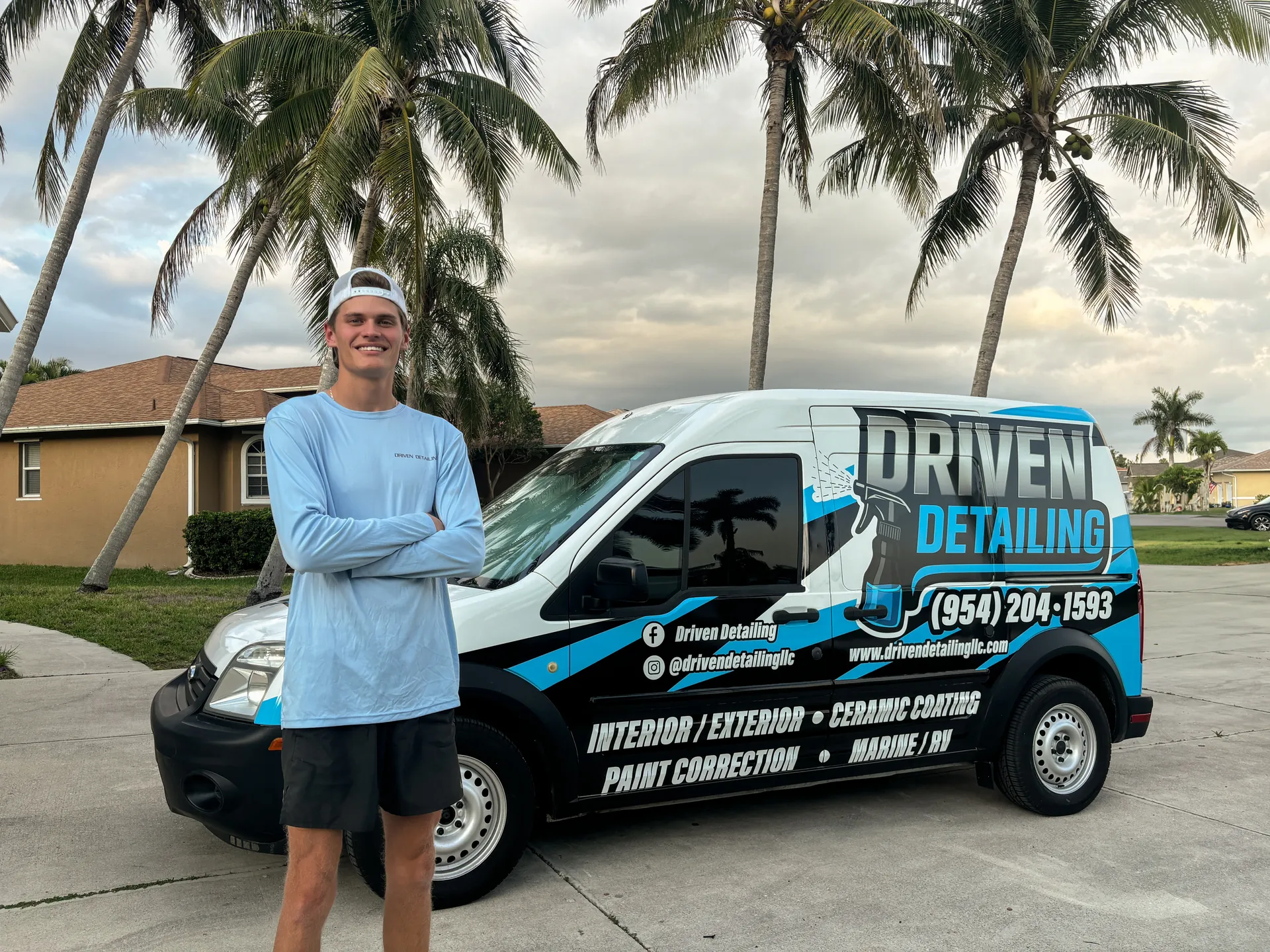Doug, owner of Driven Detailing LLC, with a detailed vehicle in Fort Myers FL